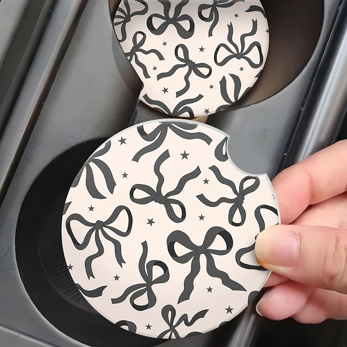 Car Coasters for Cup Holders, Car Cup Holder Coaster, Cute Car Accessories for Women Interior, 2PCS Cup Holder Coasters for Car, Anti Slip Rubber Cup Mat with A Finger Notch(Cute Black Ribbon Bow)