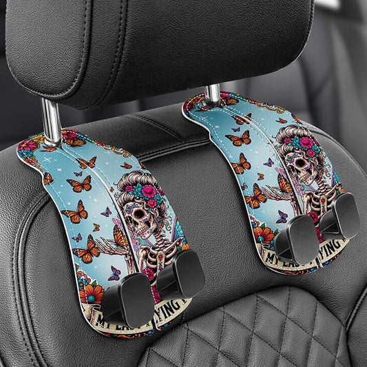 WOCOCN Purse Holder for Car, 2 Pack Heavy Duty Purse Hanger for Car, PU Leather Car Seat Hooks for Purses and Bags, Cute Skeleton Headrest Organizer for Handbags & Backpacks